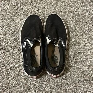 Vans black slip ons, size 7.5